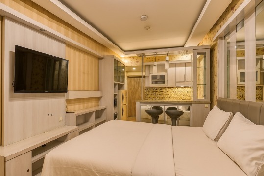 Quintessa Room at Candiland Apartement