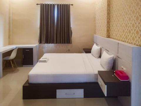 RedDoorz Syariah Near Sultan Syarif Kasim II Airport