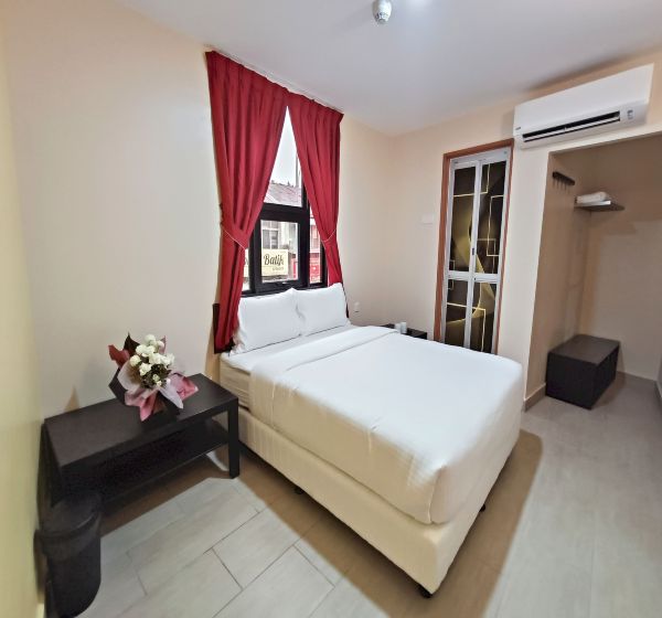 Capital O 90897 Island City Hotel